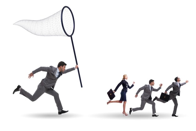 businessman chasing people with net